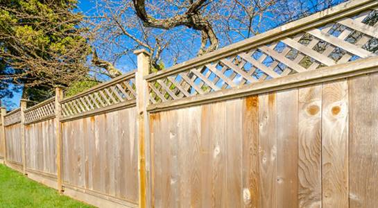 Why should I use wood preserver on my garden fence?